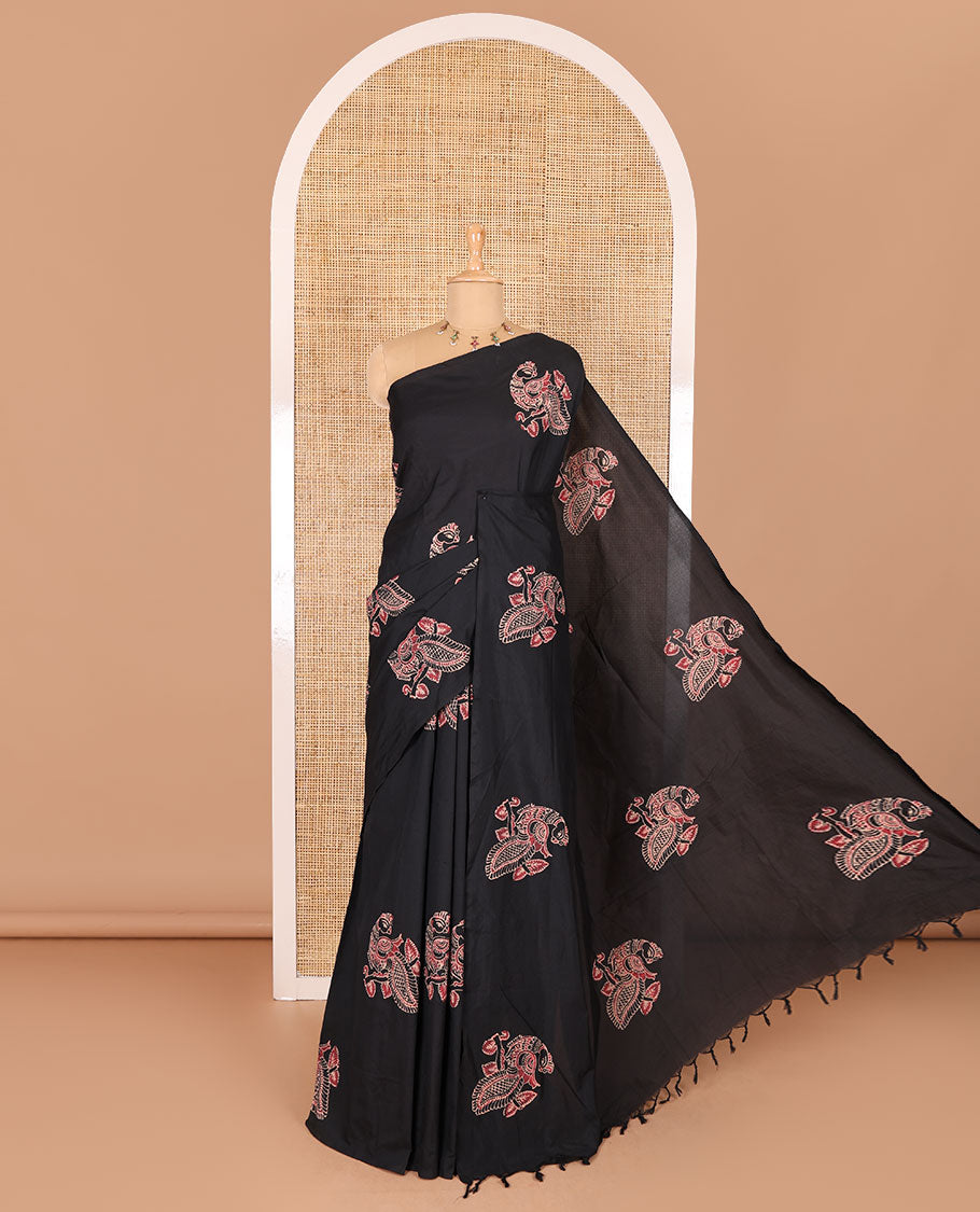 Borderless black peacock motifs printed South cotton saree with a matching blouse, and a contrast floral motifs printed blouse