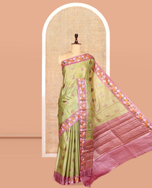 Green Tusser Silk Saree, Adorned with Buttas, a Contrast Floral Embroidered Border, Grand Pallu, and a Contrast Blouse