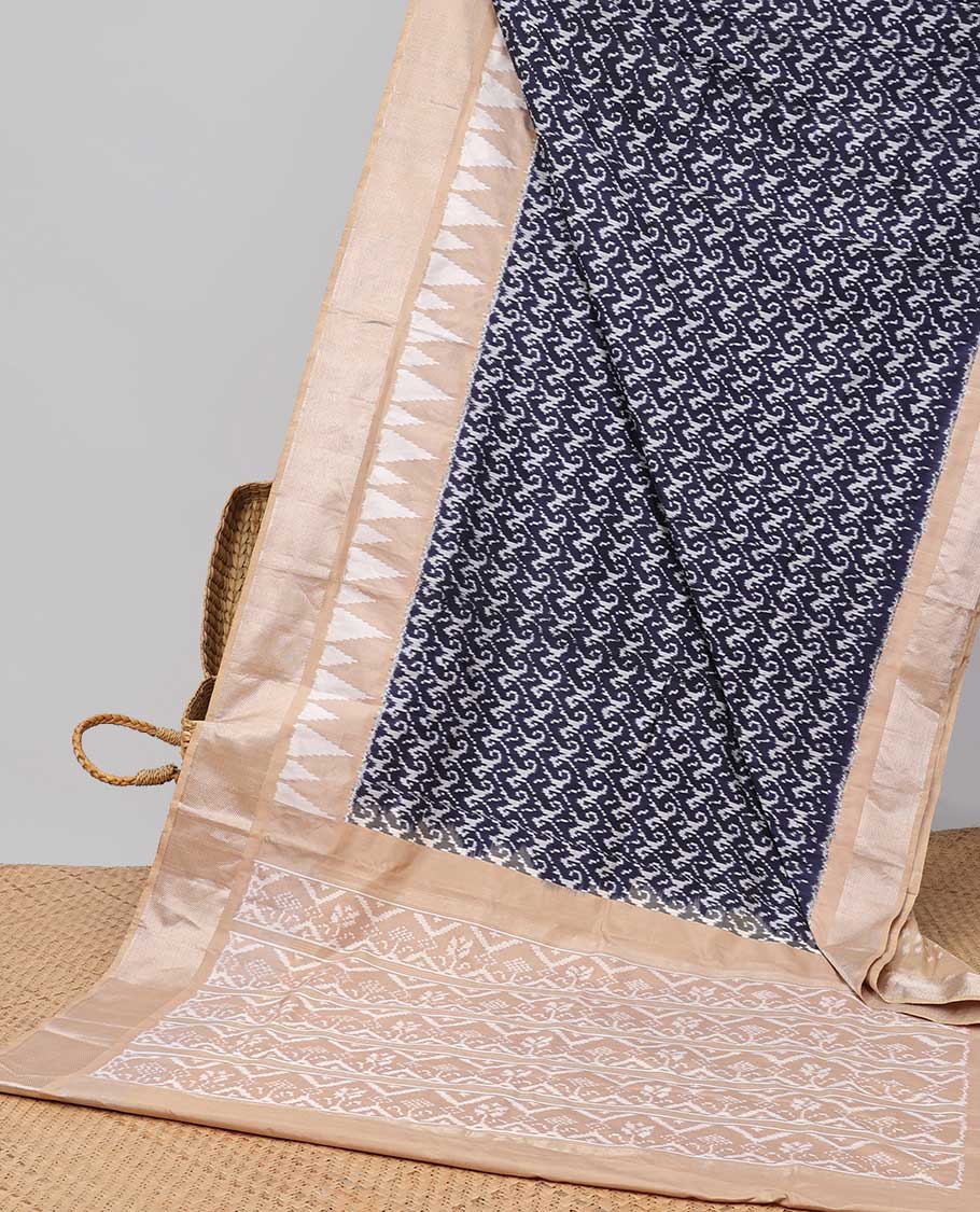 Blue intricate design ikkat saree with triangle motifs & geometric, floral motifs pallu