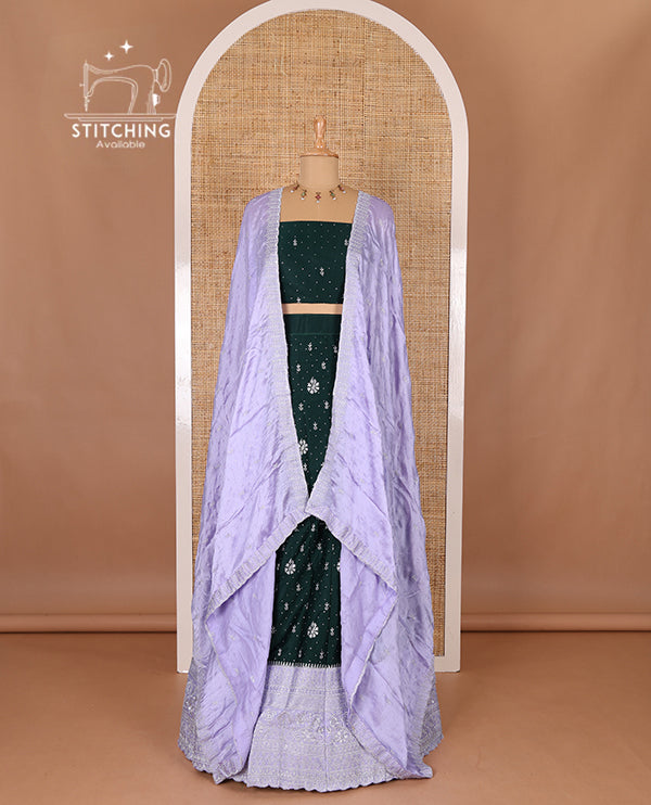 Dark Green half-saree, floral motifs embroidered semi raw silk top, matching embroidered blouse, and contrast scallop embroidered georgette dhavani