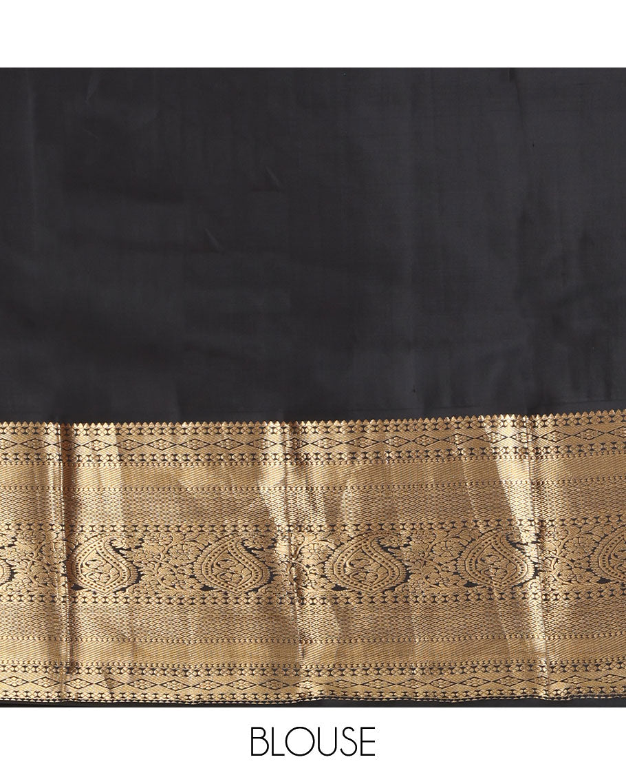 Blue Vasundhara Silk Saree, Adorned with Zari Buttas All Over Its Body, Complemented by Contrast Border of Rekku, Lavangam, Diamond, Mayil Kann, and Arumbu Manga Designs, Pallu of Mughal-Style Jaal Designs, and Paired with a Contrast Blouse