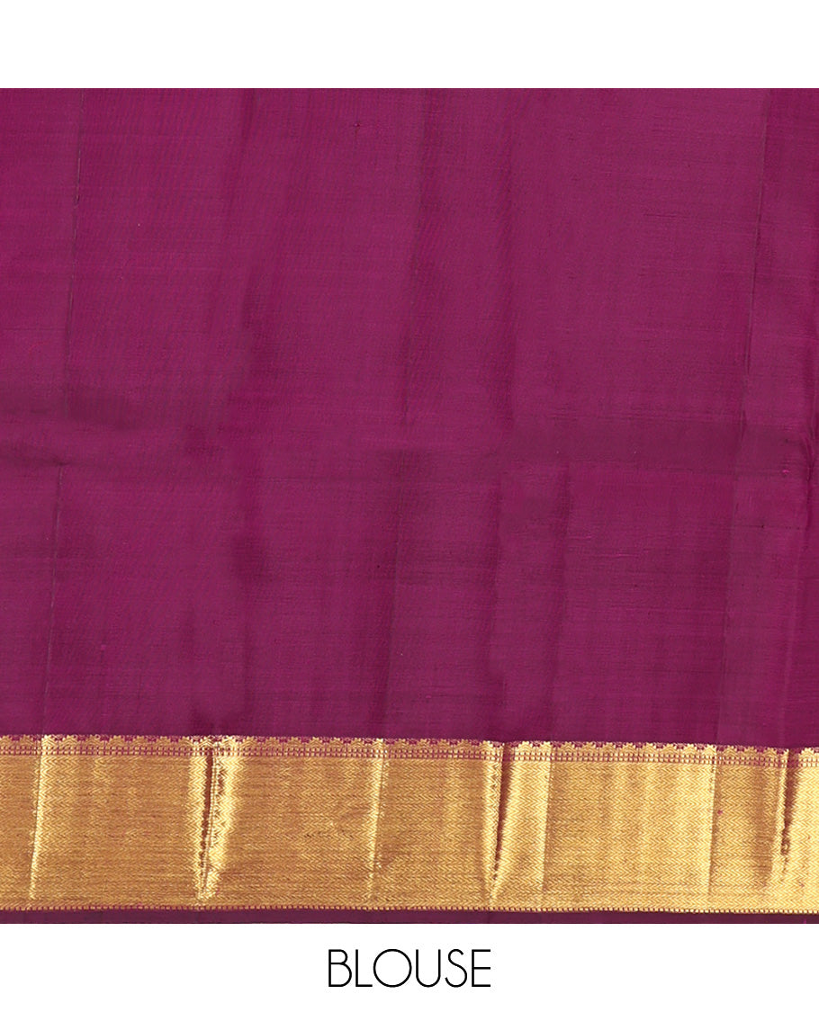 Wine Parampara Silk Saree, Enriched with Zari Buttas and Embossed Texture On Its Body, Highlighted by Zari Border of Thazampoo Rekku, Muthu, and Vanki Designs, Pallu Features Vanki Designs and Paired with a Matching Blouse