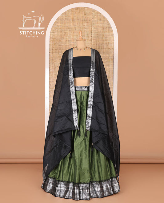 Green taffeta silk half-saree, plain with a contrast traditional design bordered skirt, contrast blouse, and traditional zari bordered blouse