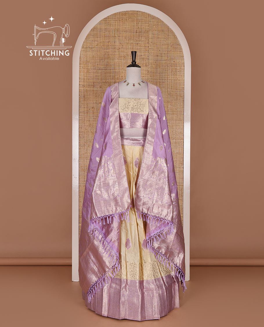 Cream taffeta silk half saree, meena buttas skirt, contrast lavender traditional zari border, matching blouse, and zari woven dhavani