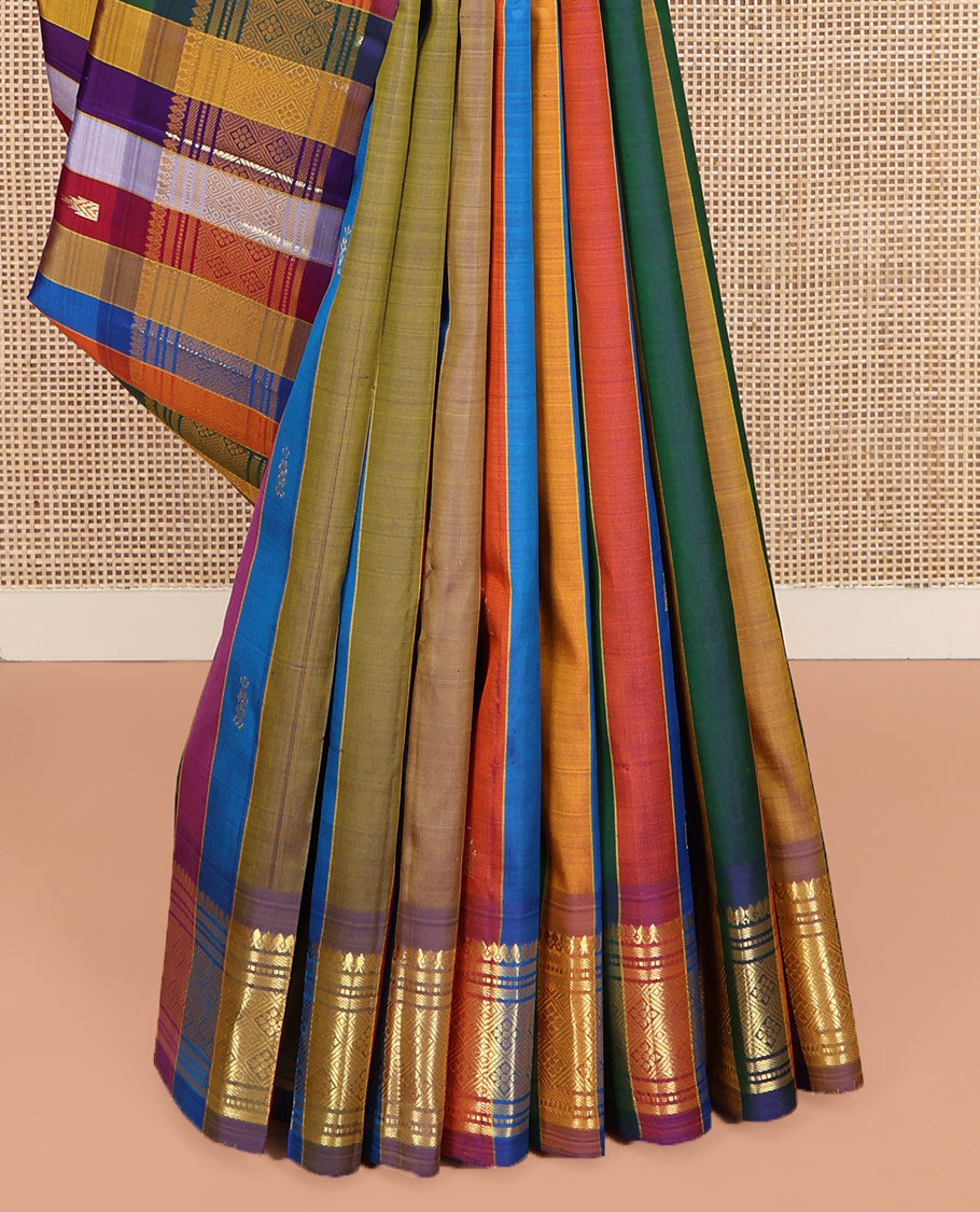 Multi-Color Kanchipuram Silk Saree, Embellished with Stripes and Zari Buttas on Its Body, Highlighted by One-Sided Zari Border of Thilakam Mokku, Banaras, Muthu, and Jaal Designs, Pallu Features Zari Designs, and Comes Without a Blouse