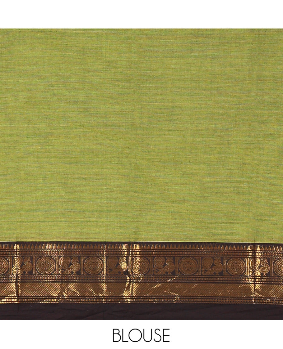 Green Plain Chettinad Cotton Saree, Complemented By Contrast Kal Eragina Traditional Zari Designs Woven Border, Subtly Striped Pallu, and Paired with a Matching Blouse