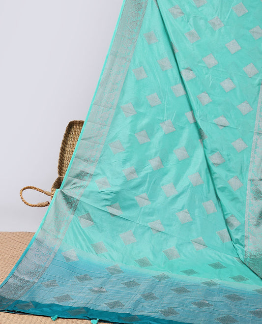 Green geometric motifs semi-banaras tussar saree with contrast intricate zari border & striped, geometric motifs pallu