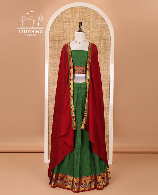 Green mercerised cotton half-saree, plain & contrast paithani peacock border skirt, matching blouse & contrast plain zari border dhavani