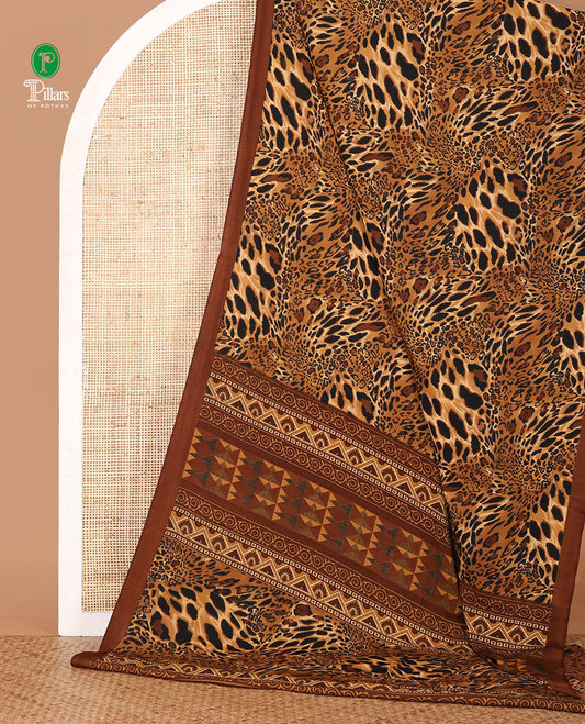Brown leopard-skin-like printed crepe silk saree, plain piping border, geometric motif printed pallu & animal-skin print blouse