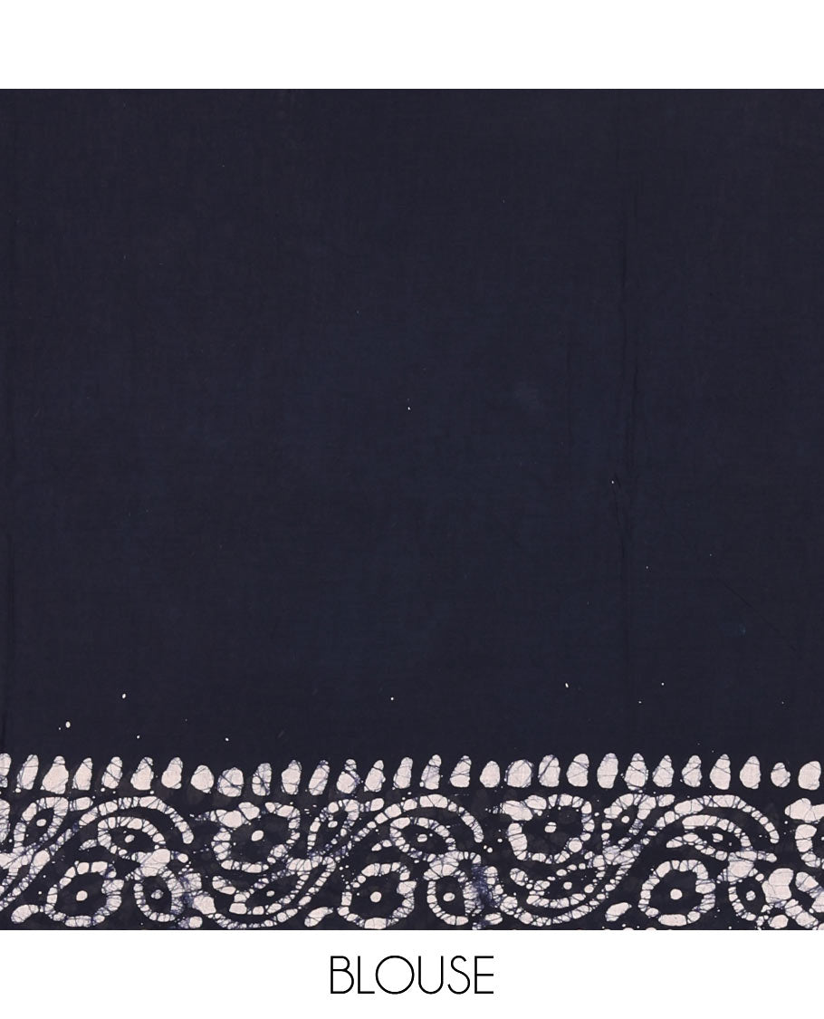 Navy blue-green batik floral printed soft cotton saree, batik printed pom-pom tasseled border, batik floral printed pallu, and a matching blouse