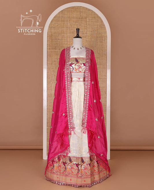 Cream banaras halfsaree, jaal jacquard skirt, contrast green paithani border, matching blouse, and Syska georgette embroidered dhavani