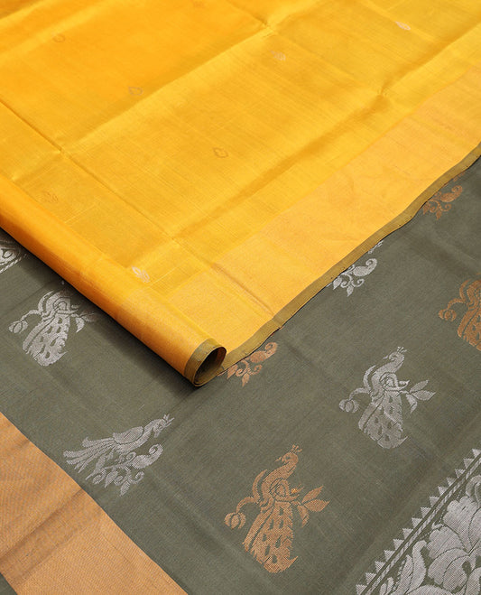 Orange floral buttas uppada saree with self animal design border & florl, peacock design pallu