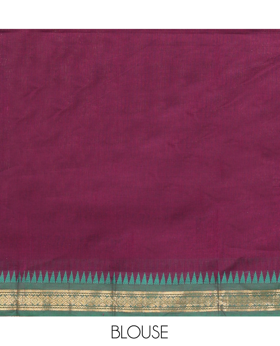 Purple Cotton Half-Saree Features Plain Skirt, a Contrast Temple Border, a Matching Blouse, and a Contrast Dhavani
