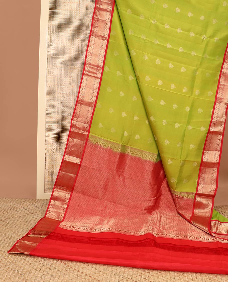 Green leaf buttas silk saree with contrast border of banaras, kathir, paun design & geometric design pallu