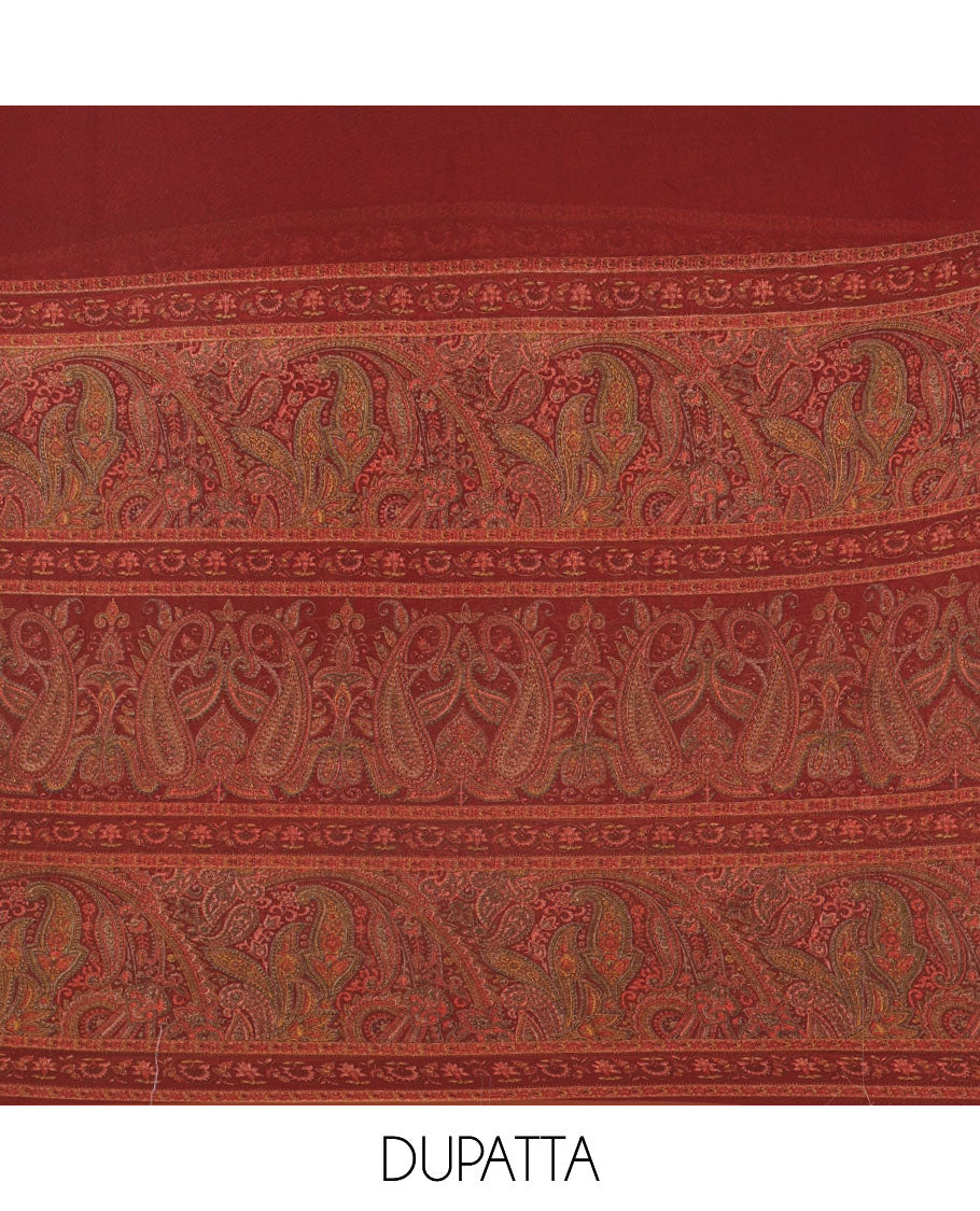 Reddish maroon Italian crepe material chudidar set, paisley printed top, plain bottom, and floral-paisley printed georgrette dupatta