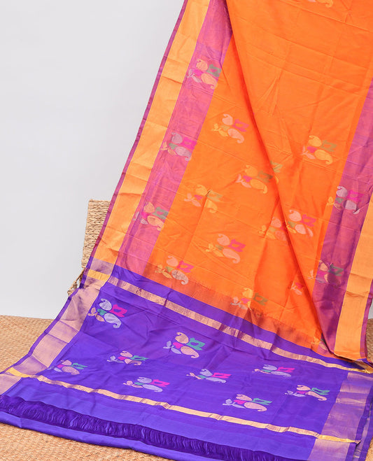Organge floral buttas uppada silk saree with contrast plain border & floral , zari design pallu