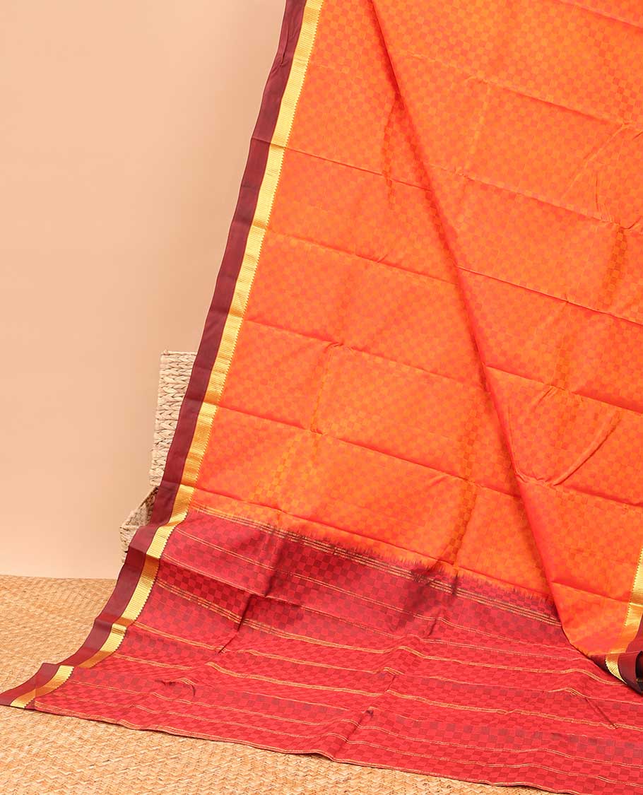Orange checked kancheepuram silk saree with contrast temple border & checked design pallu