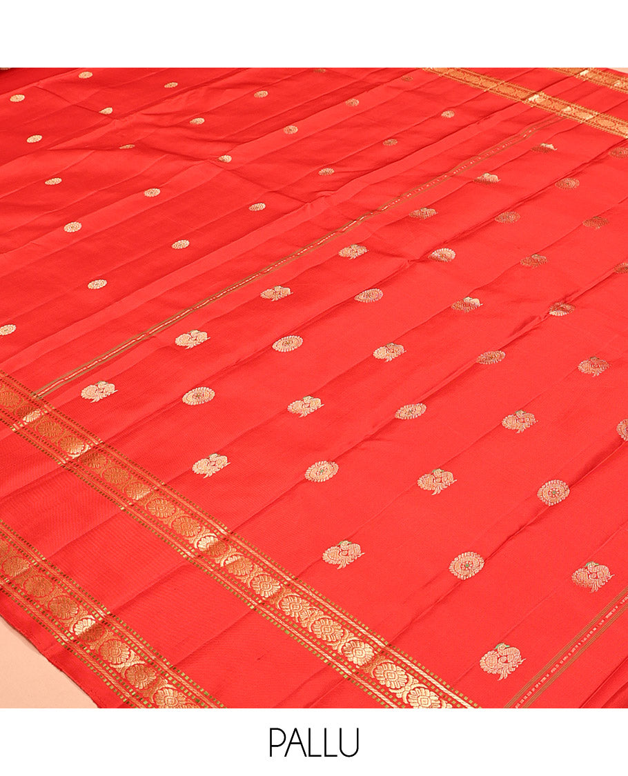 Red Kanchipuram Silk Saree, Woven with Chakram Buttas, a Rettai Pettu Border of Muthu, Banaras, and Cross Kamalam Designs, Mayil-Chakram Pallu, and a Matching Blouse