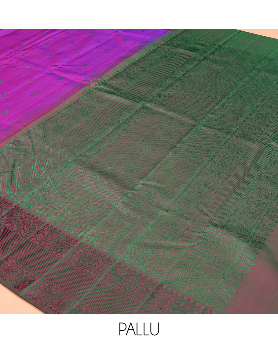 Purple Kanchipuram Silk Saree, Adorned with Diamond and Mayil Thread Buttas on Its Body, Complemented by a Contrast Border of Thilakam Mokku, Iruthalai Pakshi, and Kuyil Kann Designs, Pallu of Jaal Designs, and Paired with a Contrast Blouse