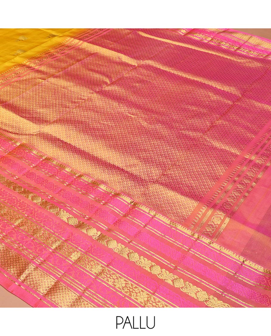 Yellow Venkatagiri Silk Saree, Sparsely Woven with Zari Buttas All Over Its Body, Complemented by a Contrast Border of Temple, Floral, and Peacock-Eye Designs, Pallu of Peacock Eye Designs, and Paired with a Contrast Blouse