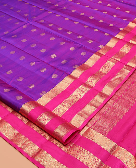 Purple Vasundhara Silk Saree, Adorned with Mayil and Chakram Buttas, Complemented by Contrast Varisai Pettu Border, Grand Jaal Pallu, and a Contrast Blouse
