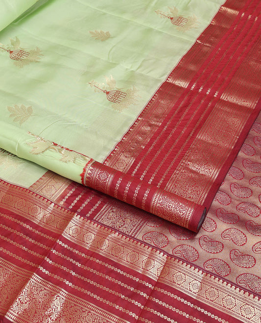 Mint green buttas vasundhara elite silk saree with traditional zari design border & paisley, floral design pallu
