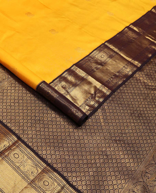 Yellow annam chakram buttas Kanchipuram korvai silk saree, contrast neer korvai border of thilakam mokku,muthu,diamond,round yaanai, chakram, and mayil kann, and pallu of poun designs
