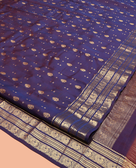 Blue Vasundhara Lite Silk Mix Saree, Adorned with Zari Buttas, Zari Border of Kathir, Muthu, and Mayil Designs, Scallop Pallu, and Matching Blouse
