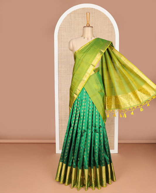 Green floral buttas silk half saree with contrast thilakam mokku, paun design border, zari design blouse & zari design border dhavani