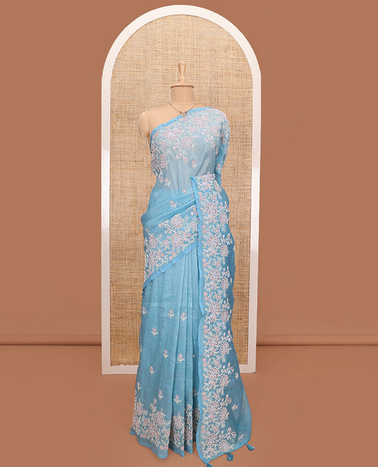Blue floral motifs thread embroidered tissue saree, floral vine embroidered border, and pallu
