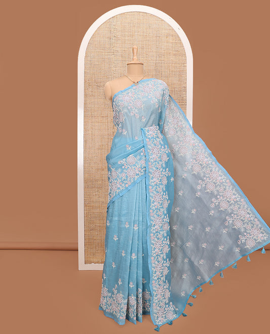 Blue floral motifs thread embroidered tissue saree, floral vine embroidered border, and pallu