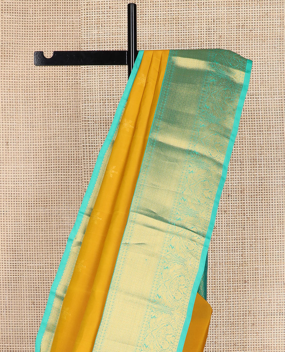 Yellow zari buttas vasundhara silkmix saree,contrast intricate pallu & border of poun,banaras,paayadi kann,mayil & yaali