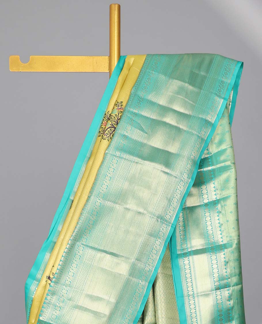 Yellow tree buttas budget silk saree with contrast intricate zari design border & floral zari design pallu
