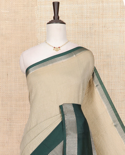 Grey Assam Silk Saree Subtly Sparkled with Zari Checks, Complemented by Contrast Zari Border of Triangle Motifs, a Gleaming Pallu of Zari Stripes, and Paired with a Contrast Blouse