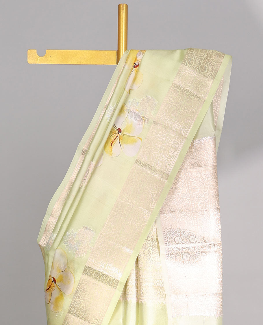 Yellow floral printed dupion silk saree with self floral zari design border & intricate zari design pallu