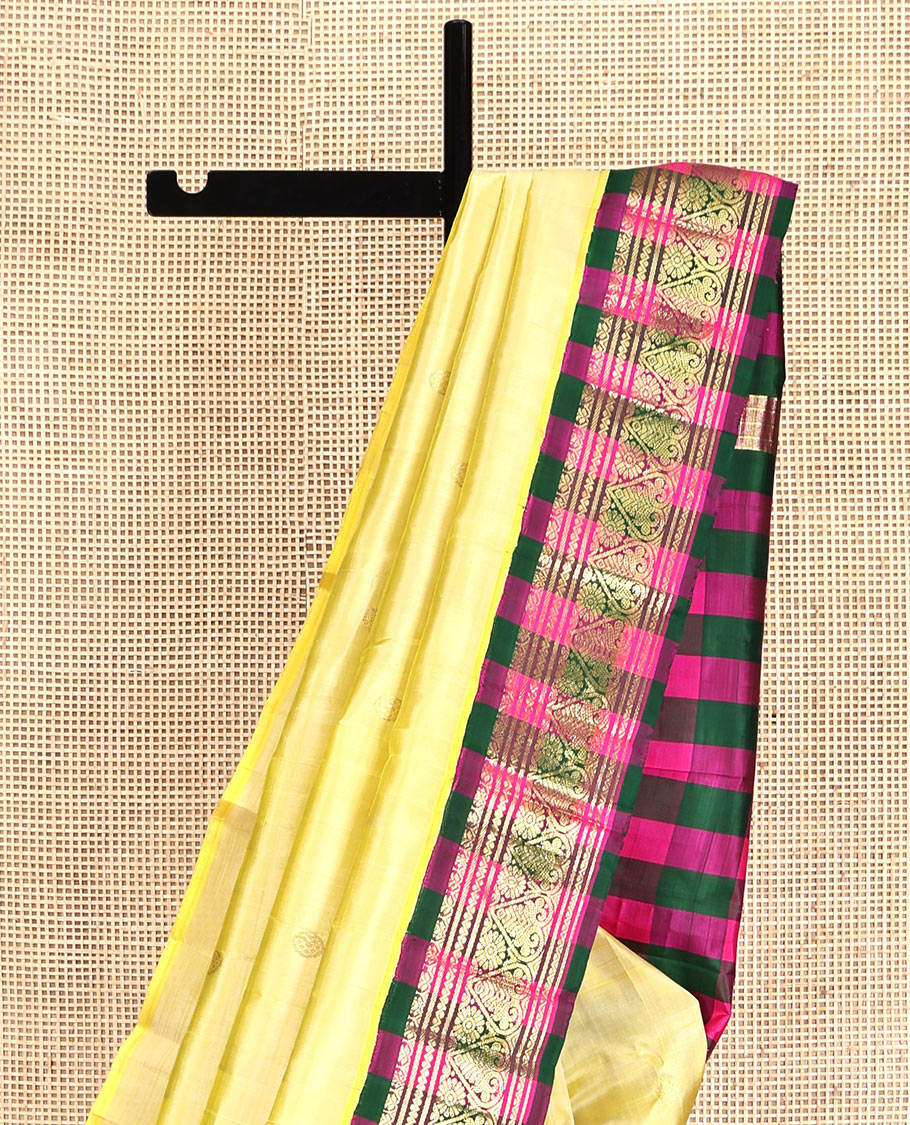 Yellow Kanchipuram Silk Saree, Subtly Sparkled with Zari Buttas, a Contrast One-Sided Korvai Checked Border of Neli, Banaras, and Jada Nagam Designs, Zari Design Pallu, and No Blouse