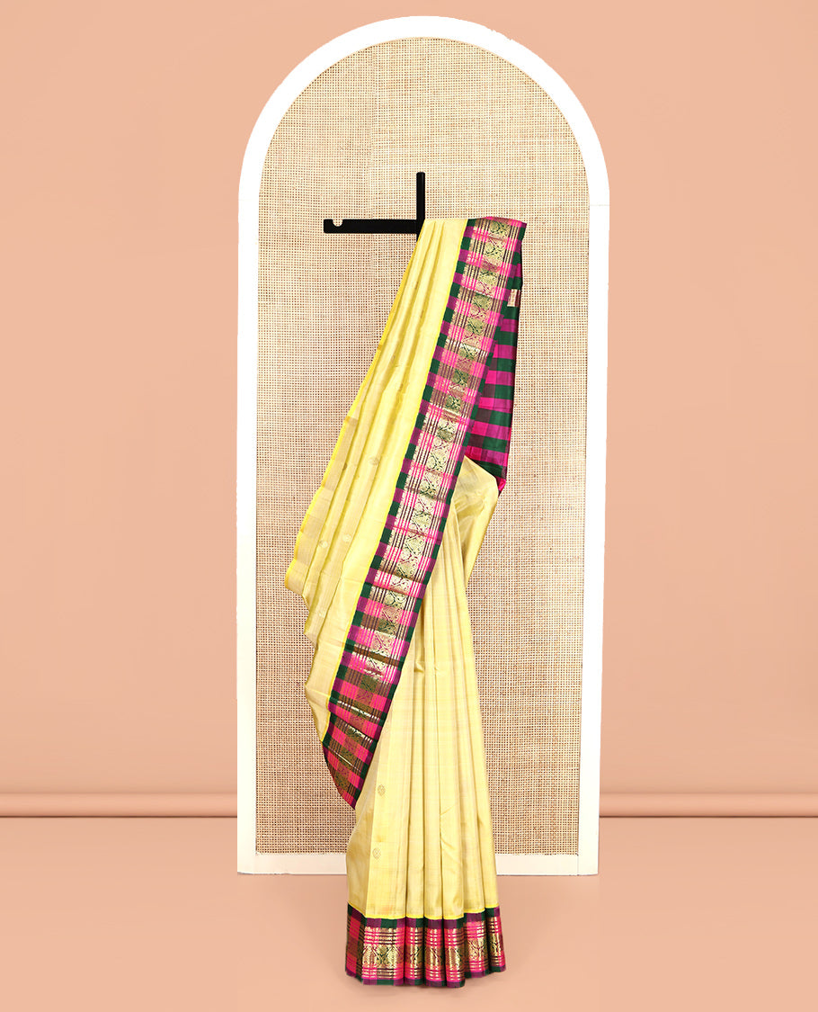 Yellow Kanchipuram Silk Saree, Subtly Sparkled with Zari Buttas, a Contrast One-Sided Korvai Checked Border of Neli, Banaras, and Jada Nagam Designs, Zari Design Pallu, and No Blouse