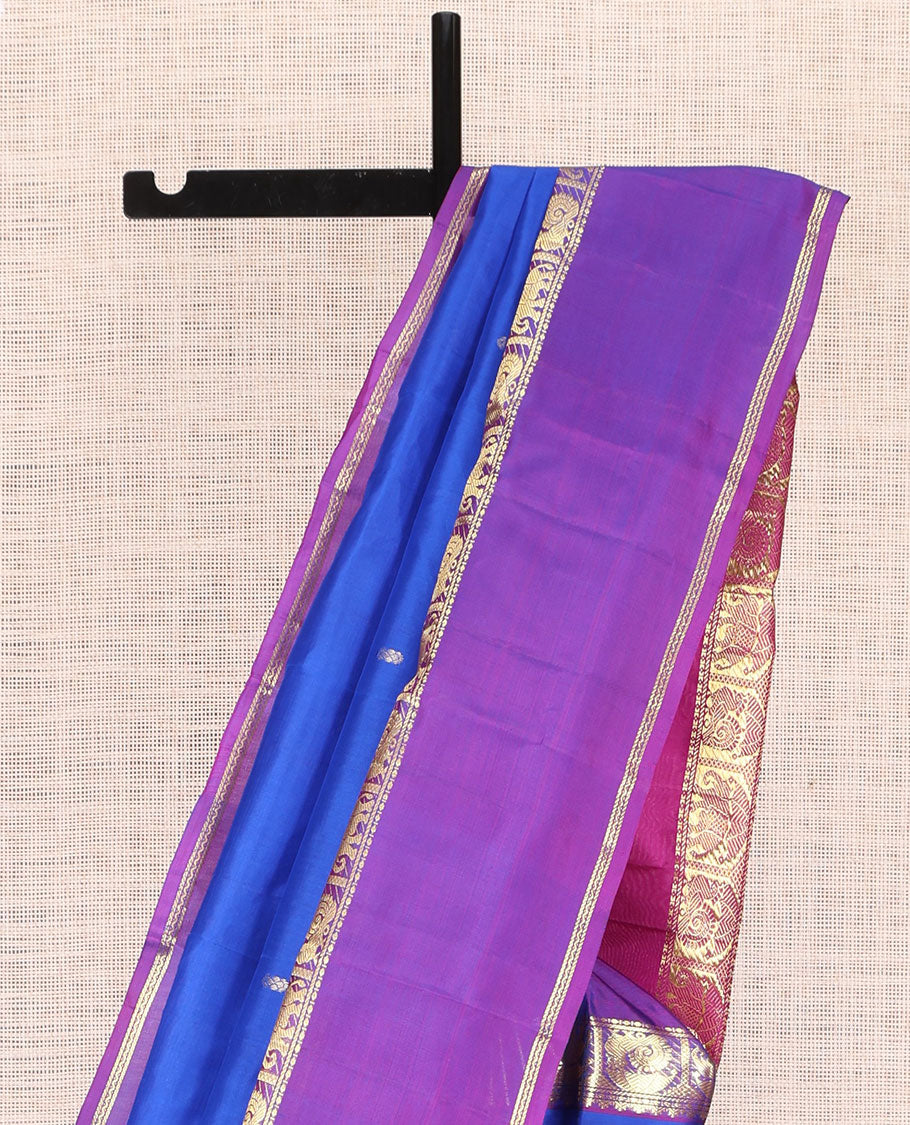 Royal Blue Plain Kanchipuram Silk Saree, a Contrast Rettai Pettu Border of Thazampoo Rekku, Banaras, Neli, Mayil, and Yaanai Designs , Zari Design Pallu, and a Contrast Blouse
