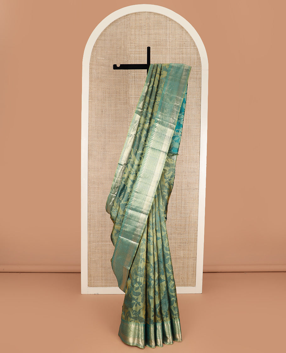 Green floral brocade Kanchipuram silk saree, zari border and pallu steeped with geometric patterns