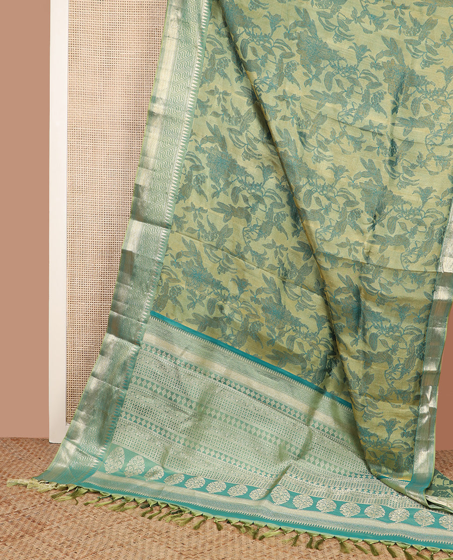 Green floral brocade Kanchipuram silk saree, zari border and pallu steeped with geometric patterns