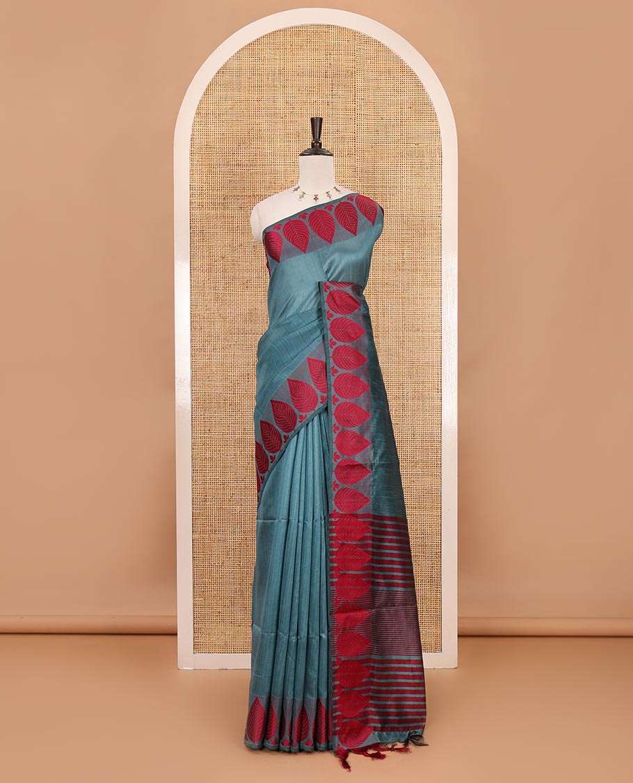 Green plain jute cotton saree , contrast leaf thread butta border & lining seer pallu with tussels