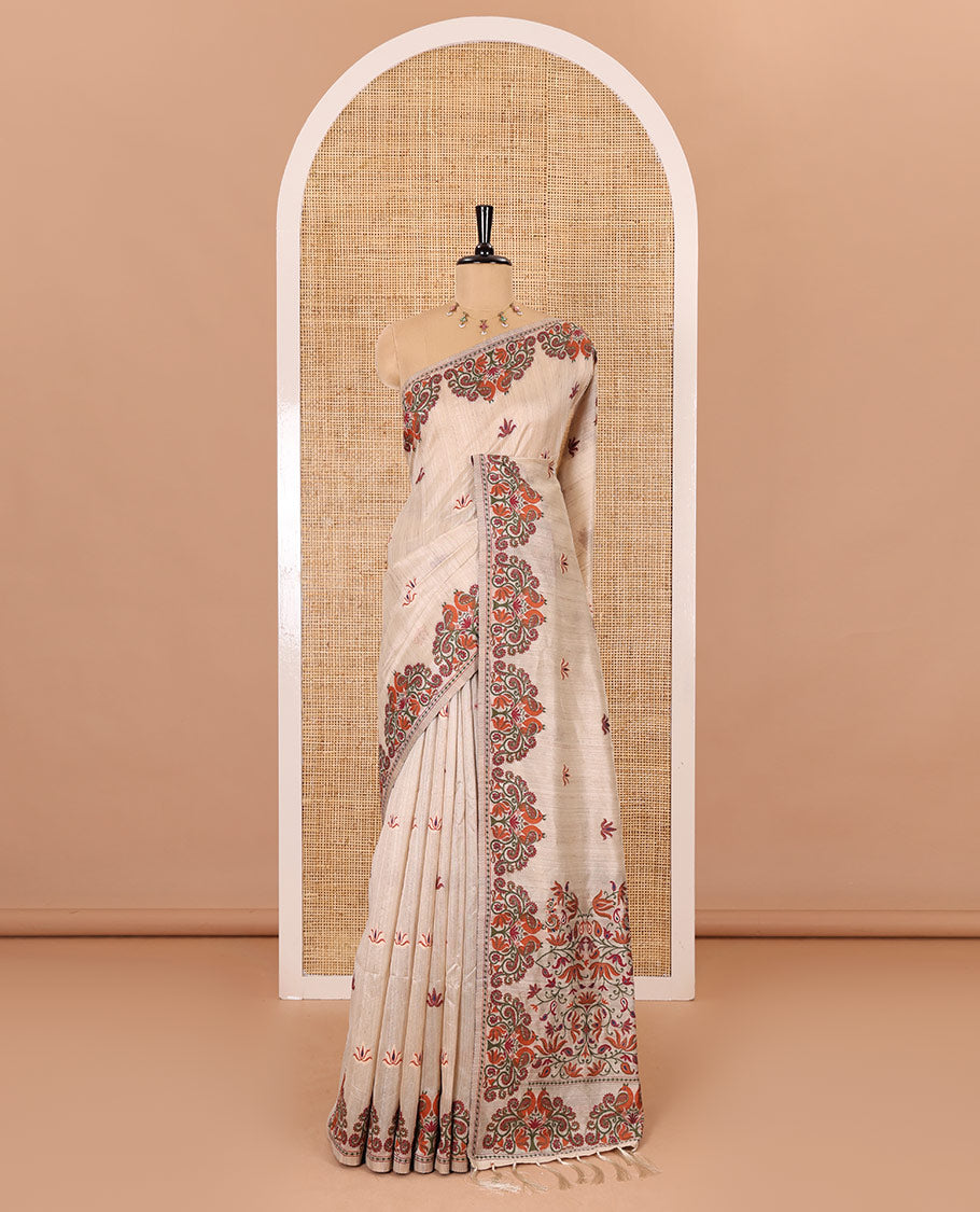 Cream lotus motifs thread woven jute cotton, scallop thread woven border, pallu of lotus, peacock and paisley designs along with a plain blouse