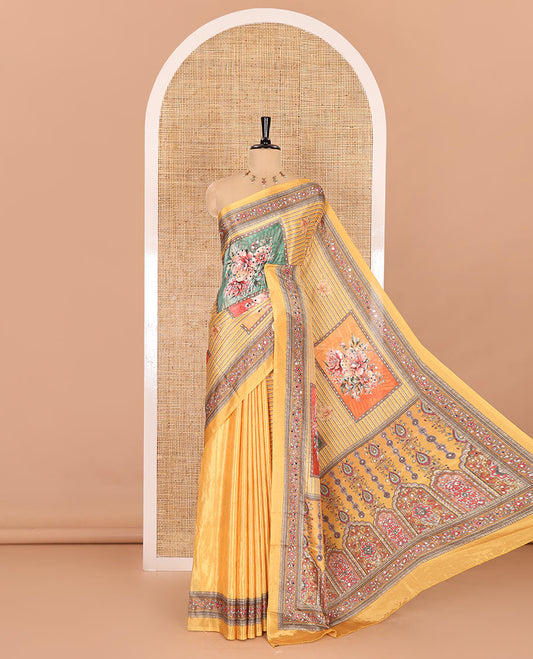 Yellow floral-printed and mirror-work masakali saree, printed with mirror-work border, an intricately decked-up Mughal-style pallu, and a matching blouse