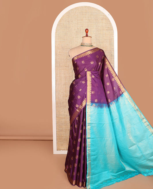 Purple peacock chakram motifs budget silk saree, traditional zari border, and contrast jaal patterned pallu