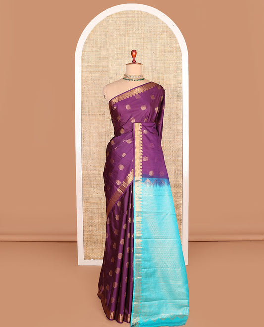Purple peacock chakram motifs budget silk saree, traditional zari border, and contrast jaal patterned pallu