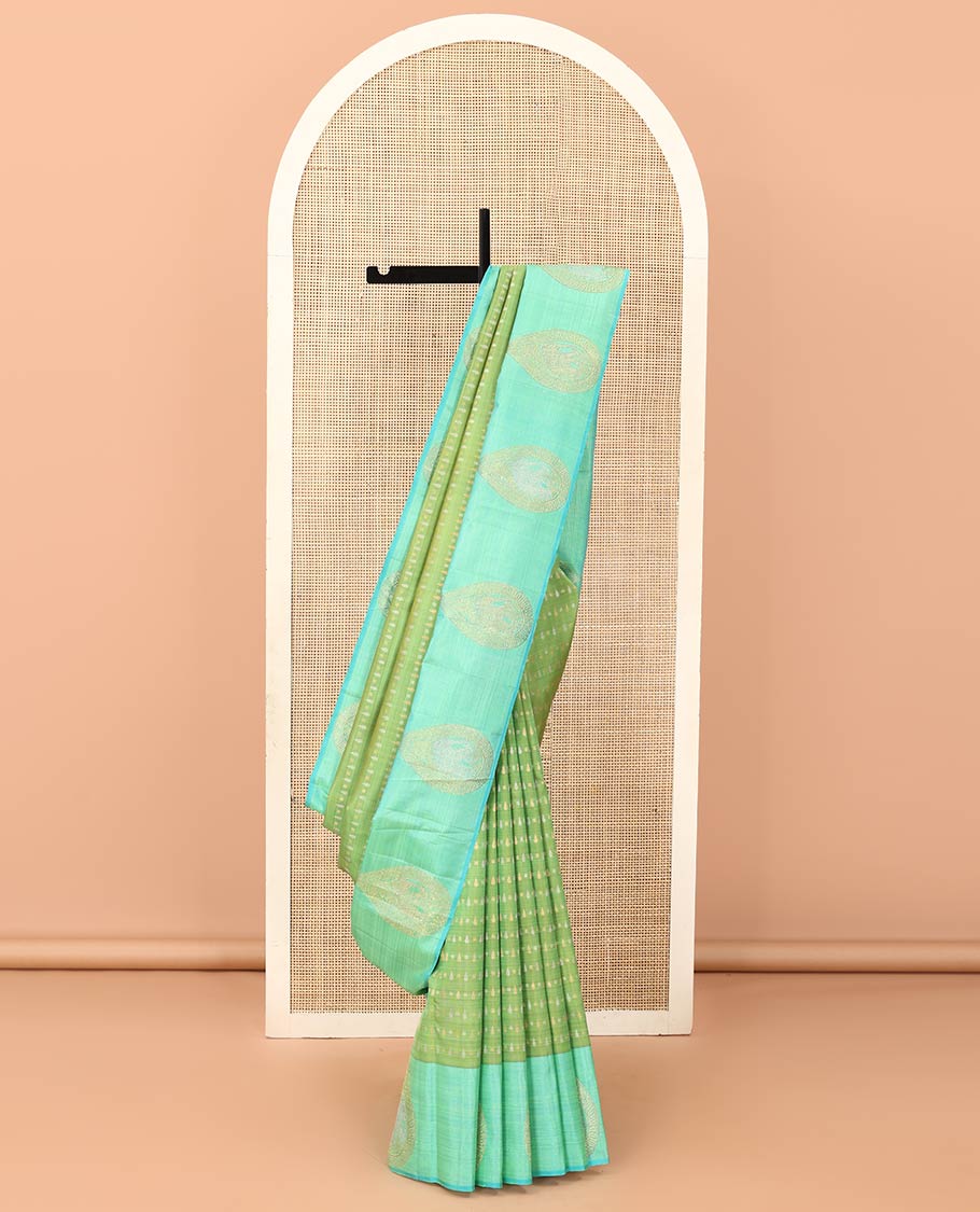 Green zari buttas Kanchipuram designer saree, contrast mayil butta enclosed thilakam design border, and jaal pallu
