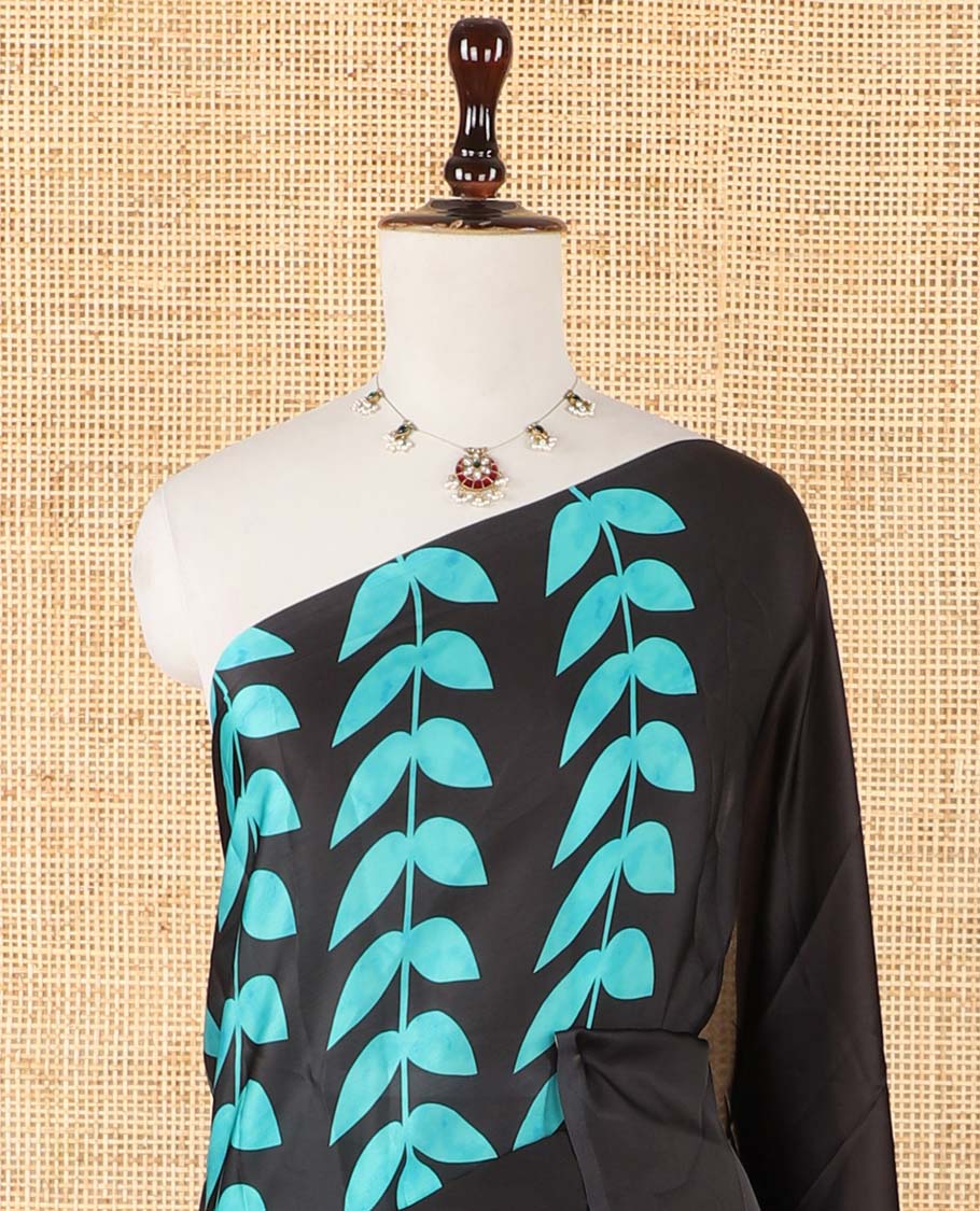 Borderless black half-half style crepe silk saree printed with green color leaf vine design, leaf motifs printed blouse