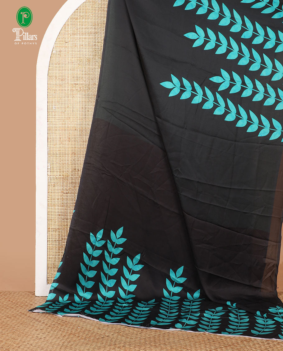Borderless black half-half style crepe silk saree printed with green color leaf vine design, leaf motifs printed blouse