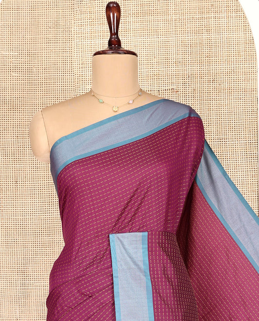 Maroon Aarani Gift Saree, Steeped with Buttas on Its Body, Complemented by a Contrast Border, a Self-Pallu of Stripes, and Paired with a Matching Blouse