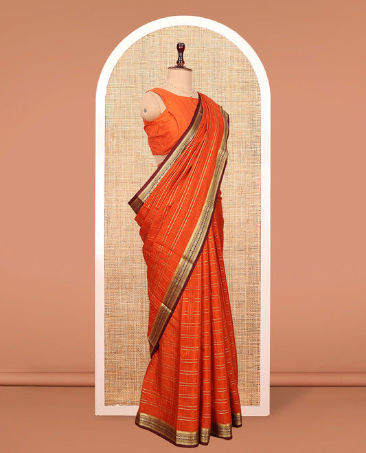 Orange Mysore Silk Saree, Adorned with Zari Checked Design on Its Body, Complemented by a Contrast Traditional Zari Design Border, Pallu Pictures Floral and Bird Designs, and Paired with a Contrast Blouse